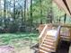 Spacious deck overlooks a private backyard with storage shed at 1386 Sandy Ln, Decatur, GA 30032