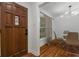 Dining area with hardwood floors and modern light fixture at 1386 Sandy Ln, Decatur, GA 30032