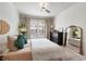 Large bedroom with a king-size bed and a large mirror at 1850 Cotillion Dr # 2304, Atlanta, GA 30338