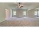 Large main bedroom with vaulted ceilings, carpet and ceiling fan at 509 Dolce Rd, Locust Grove, GA 30248