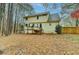 Two story house back view, deck and fenced yard at 4684 Pine Dr, Loganville, GA 30052