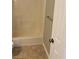 Bathroom with a shower/tub combo and tile flooring at 1511 Harbor Watch Ct, Woodstock, GA 30189