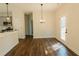 Dining area with hardwood floors and chandelier lighting at 5965 Crowley Dr, Douglasville, GA 30135