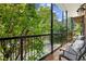 Private balcony with wrought iron railings, offering a peaceful outdoor space at 5512 Glenridge Ne Dr # E, Sandy Springs, GA 30342