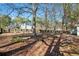 Spacious backyard with mature trees at 752 Fallowfield Dr, Loganville, GA 30052