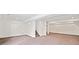 Unfinished basement with neutral walls and carpet at 904 Berry Ct, Canton, GA 30114