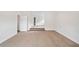Spacious bedroom with carpet and access to another room at 904 Berry Ct, Canton, GA 30114