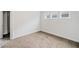 Bedroom with neutral walls, carpet, and walk-in closet at 904 Berry Ct, Canton, GA 30114