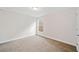 Bright bedroom with neutral walls and carpet at 904 Berry Ct, Canton, GA 30114
