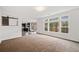 Bright and airy living room with large windows and view at 904 Berry Ct, Canton, GA 30114