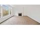 Spacious living room with fireplace and ample natural light at 904 Berry Ct, Canton, GA 30114