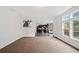 Open concept living room with views into kitchen and backyard at 904 Berry Ct, Canton, GA 30114