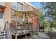 Small deck with umbrella and seating for relaxing outdoors at 174 Chester Se Ave # 109, Atlanta, GA 30316