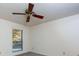 Bright bedroom with ceiling fan and large window at 811 Wynnes Ridge Se Cir, Marietta, GA 30067