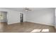 Spacious living room with hardwood floors and ceiling fan at 7256 Crestside Dr, Austell, GA 30168