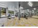 Bright fitness center with modern equipment and pool view at 775 Juniper Ne St # 111, Atlanta, GA 30308