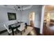 Bright dining room with hardwood floors and modern chandelier at 227 Scenic View Lane Ln, Stone Mountain, GA 30087