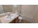 Neat bathroom featuring a tub shower combo, vanity, and tile flooring at 325 Othello Dr, Hampton, GA 30228