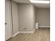 Finished basement with new flooring and neutral walls at 409 Arbor Ridge Dr, Stone Mountain, GA 30087