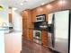 Modern kitchen with stainless steel appliances and granite countertops at 923 Peachtree Ne St # 737, Atlanta, GA 30309