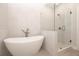 Bathroom with freestanding bathtub and glass shower at 280 Briscoe Way # 38, Alpharetta, GA 30009