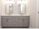 Double vanity bathroom with gray cabinets and quartz countertops at 280 Briscoe Way # 38, Alpharetta, GA 30009