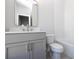 Small bathroom with gray vanity, toilet and bathtub at 280 Briscoe Way # 38, Alpharetta, GA 30009