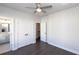 Spacious bedroom with dark hardwood floors and ensuite bathroom at 280 Briscoe Way # 38, Alpharetta, GA 30009