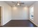 Bright bedroom with dark hardwood floors and ceiling fan at 280 Briscoe Way # 38, Alpharetta, GA 30009