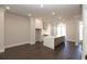 Modern kitchen with white cabinets, quartz countertops, and stainless steel appliances at 280 Briscoe Way # 38, Alpharetta, GA 30009