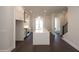 Open concept kitchen, island, and breakfast bar at 280 Briscoe Way # 38, Alpharetta, GA 30009
