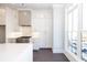 Modern kitchen with white cabinets and quartz countertops at 280 Briscoe Way # 38, Alpharetta, GA 30009