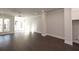 Spacious living room with hardwood floors and ceiling fan at 280 Briscoe Way # 38, Alpharetta, GA 30009