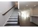 Elegant staircase leading to the upper level of the home at 280 Briscoe Way # 38, Alpharetta, GA 30009