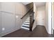 Modern staircase with dark wood and wainscoting at 280 Briscoe Way # 38, Alpharetta, GA 30009