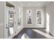 Bright sunroom with hardwood floors and access to balcony at 280 Briscoe Way # 38, Alpharetta, GA 30009