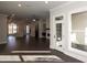 Sunroom with hardwood floors and French doors leading to deck at 280 Briscoe Way # 38, Alpharetta, GA 30009