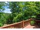 Deck with scenic wooded view at 835 Timber Lake Trl, Cumming, GA 30041