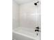 Bathroom with white subway tile and a shower/tub combo at 2485 Brentwood Rd, Decatur, GA 30032