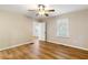 Bright bedroom with hardwood floors and a ceiling fan at 2485 Brentwood Rd, Decatur, GA 30032