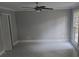 Well-lit bedroom with ceiling fan and wood-look flooring at 1947 Kensington High Sw St, Lilburn, GA 30047