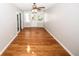 Spacious living area with hardwood floors and backyard access at 5075 Winters Chapel Rd, Atlanta, GA 30360