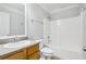 Clean bathroom, featuring a tub shower combo and wood vanity at 277 Edison Dr, Stockbridge, GA 30281