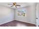 Spacious bedroom with large window and ceiling fan at 2969 Sentinel Cir, Lawrenceville, GA 30043