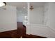 Elegant entryway with hardwood floors and decorative columns at 4100 Paces Walk # 1301, Atlanta, GA 30339