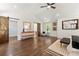 Main bedroom with hardwood floors, barn doors and a sitting area at 2133 Trailwood Rd, Decatur, GA 30032