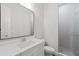 Clean bathroom with white vanity, quartz countertop and a large shower at 4002 Moody Ln, Woodstock, GA 30188