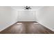 Bright bedroom with hardwood floors and ample natural light at 4002 Moody Ln, Woodstock, GA 30188