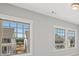 Well-lit bedroom with large windows and city views at 4002 Moody Ln, Woodstock, GA 30188