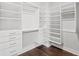 Spacious walk-in closet with custom built-in shelving at 4002 Moody Ln, Woodstock, GA 30188